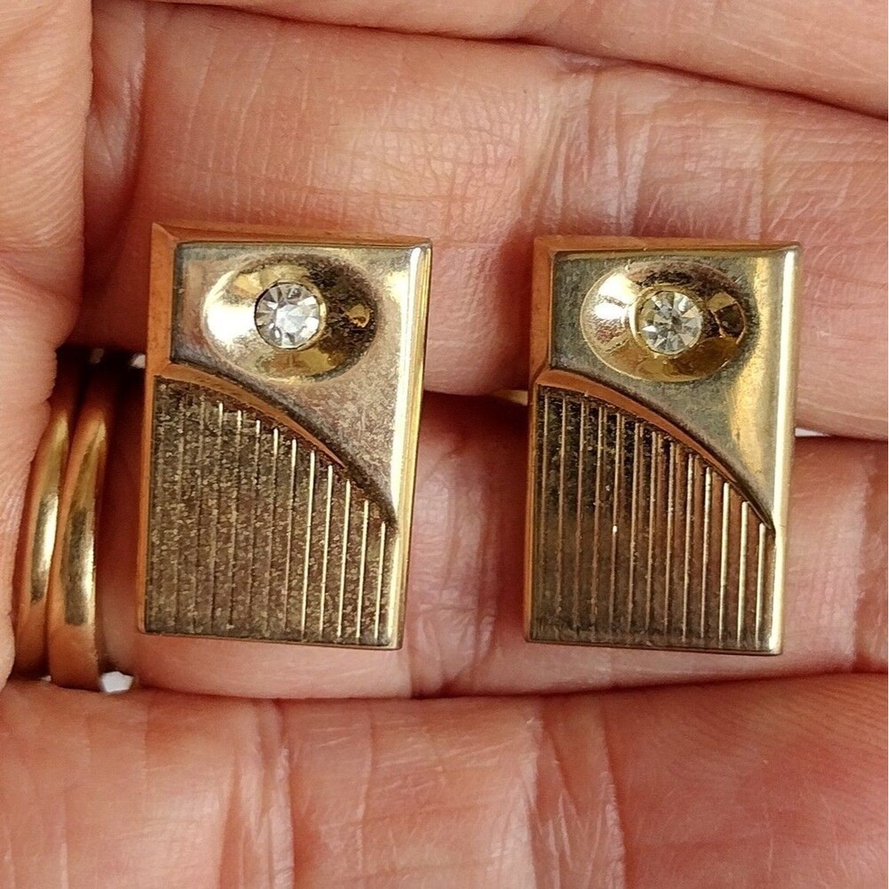 Gold-tone cufflinks with clear rhinestone